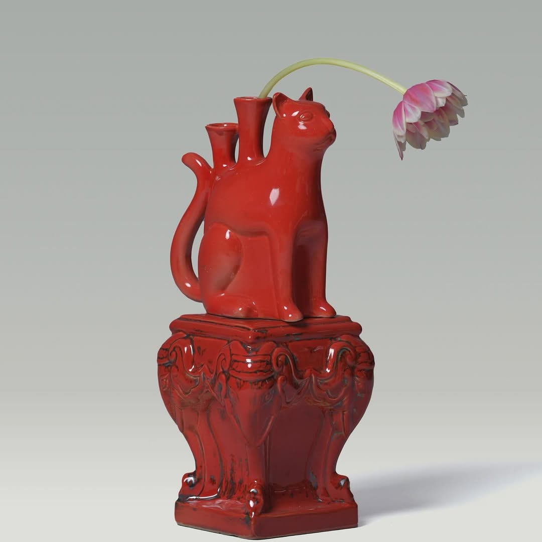 Socle en forme de nghê et d’éléphant