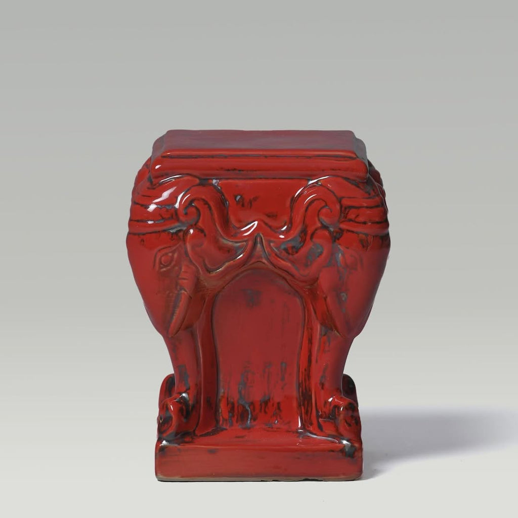 Socle en forme de nghê et d’éléphant